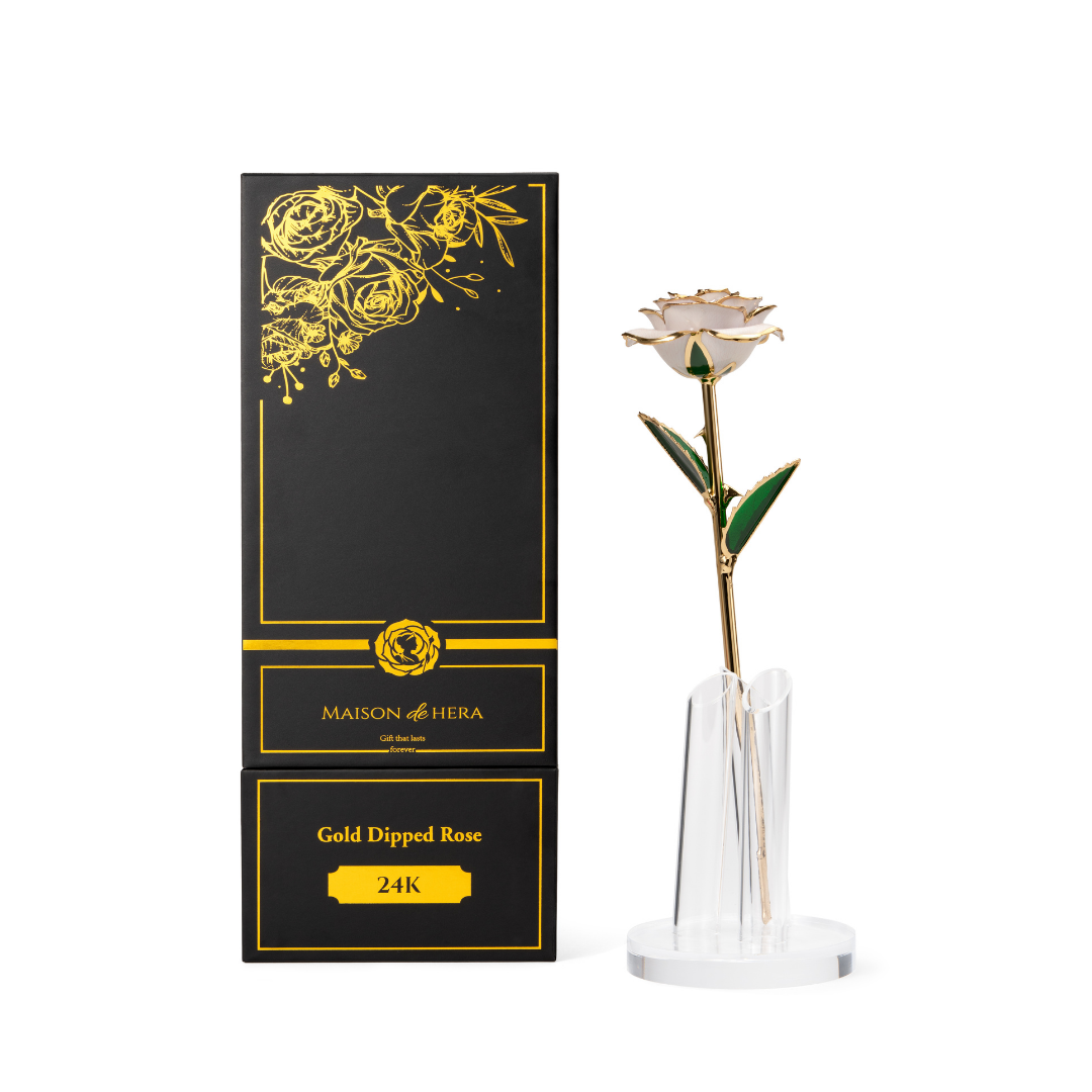 Maison de Hera Maison box next to 24K gold dipped beige rose with green enamel leaves