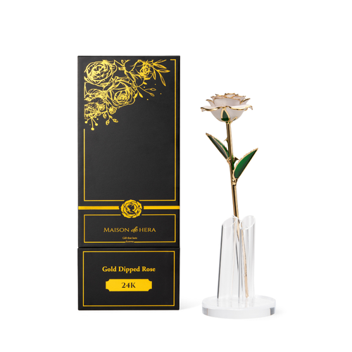Maison de Hera Maison box next to 24K gold dipped beige rose with green enamel leaves