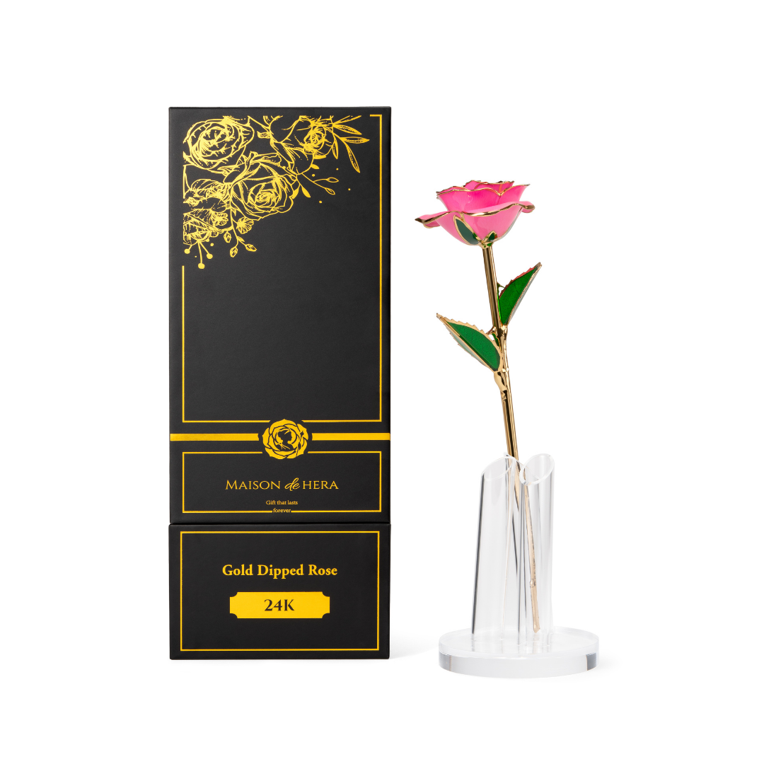 Maison de Hera Maison box next to 24K gold dipped pink rose with green enamel leaves