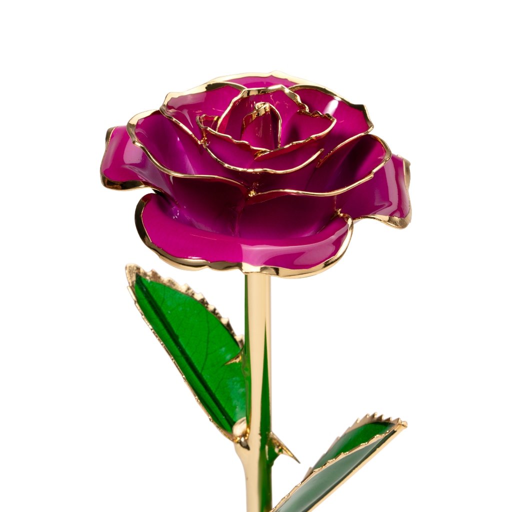 Close up of 24K gold dipped purple rose with purple enamel petals and gold trim