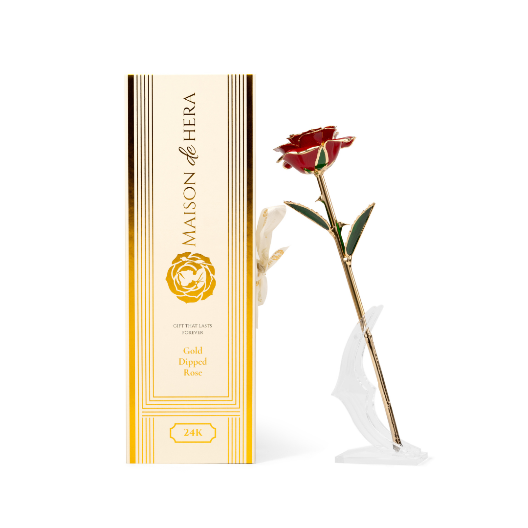 Maison de Hera Blanc box next to 24K gold dipped red rose with green enamel leaves