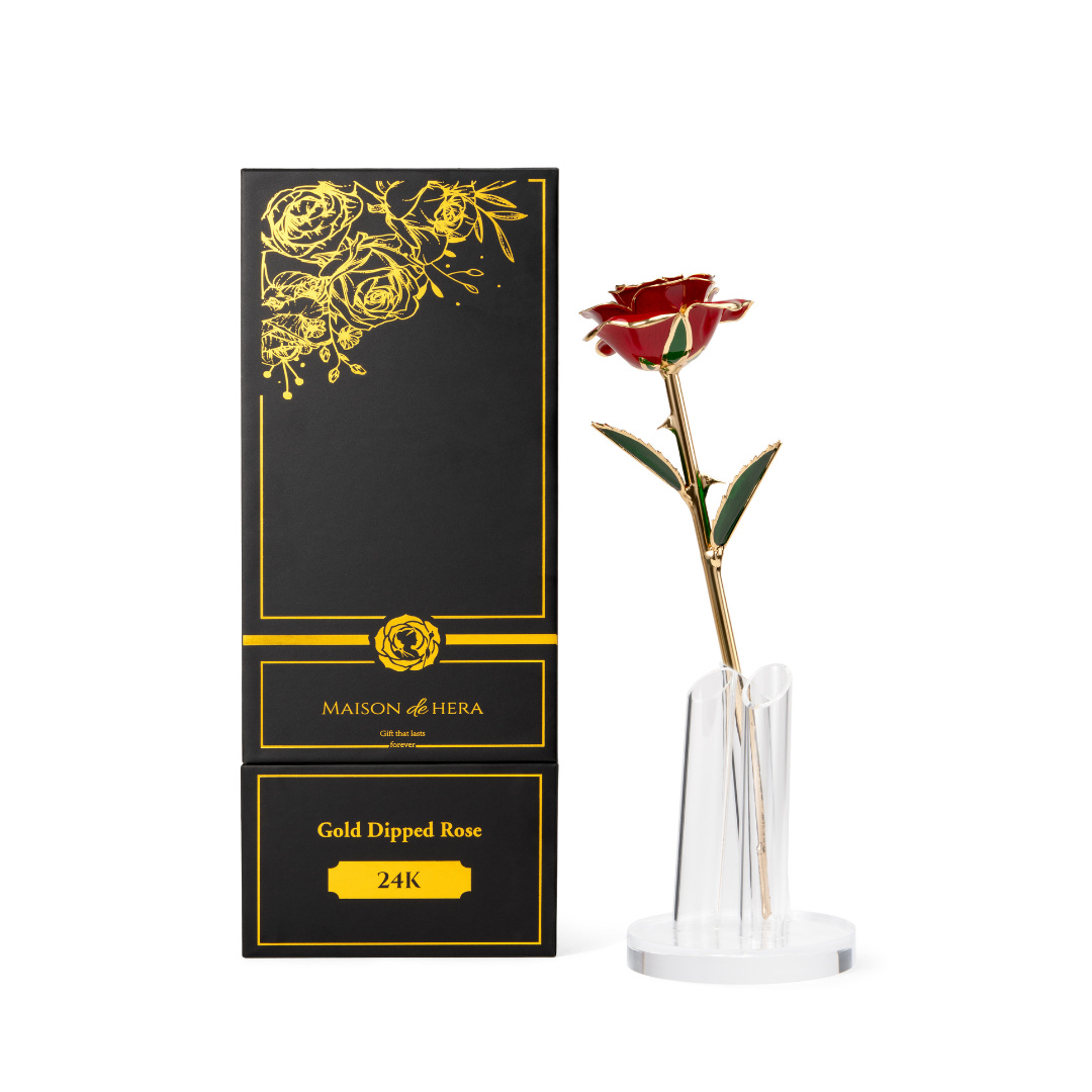 Maison de Hera Maison box next to 24K gold dipped red rose with green enamel leaves