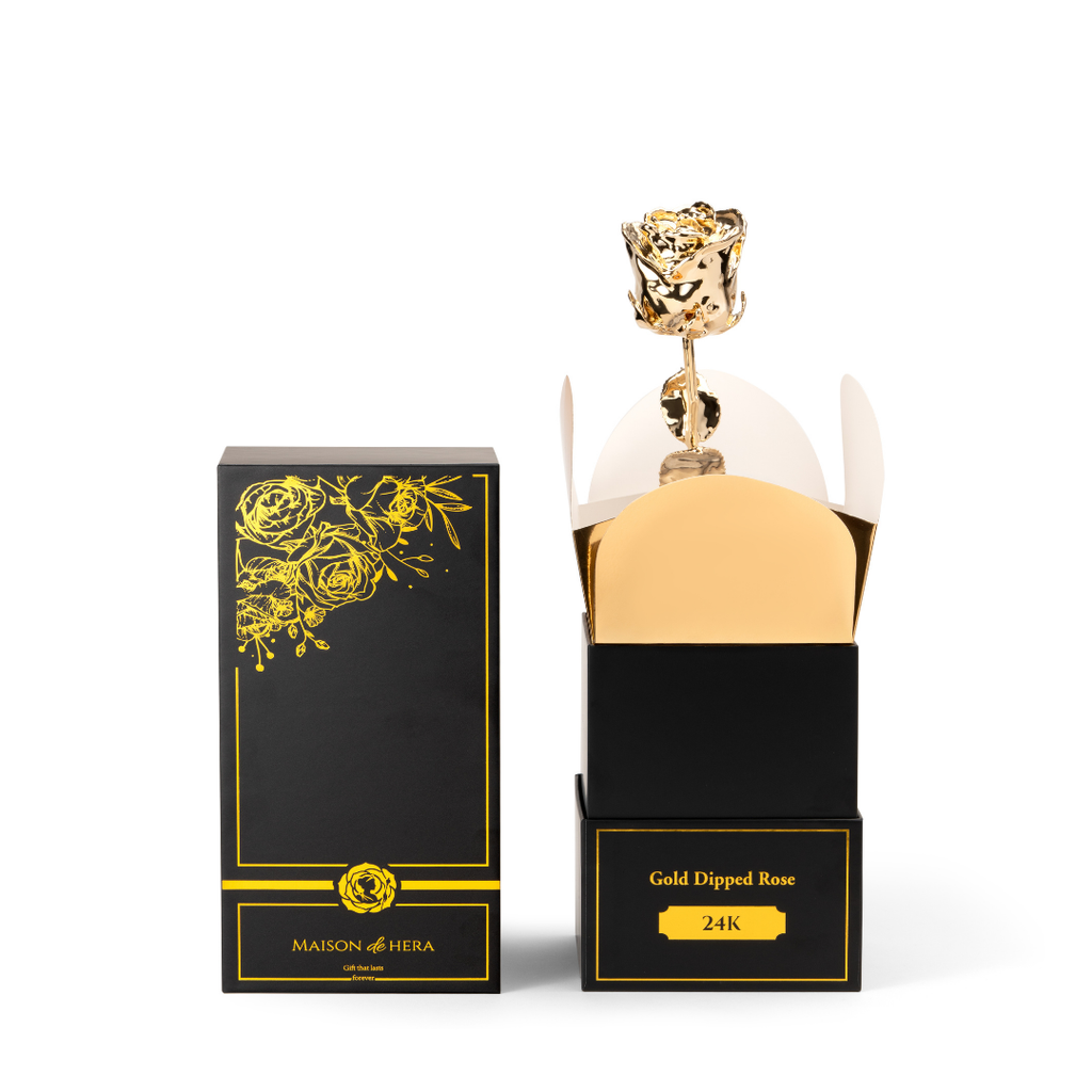 Maison de Hera black Maison Edition box open showing 24K gold dipped rose on display stand