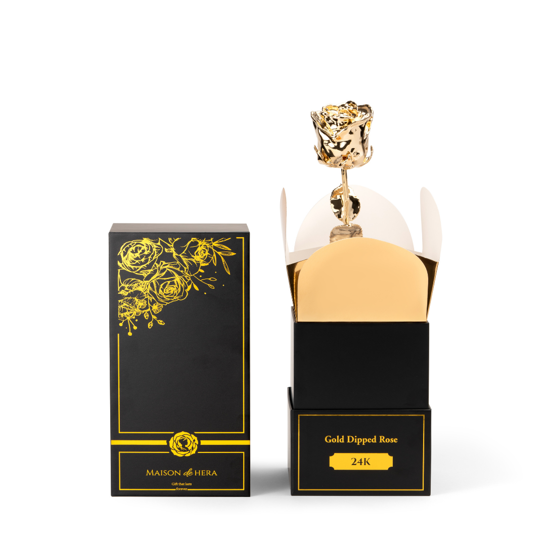 Maison de Hera black Maison Edition box open showing 24K gold dipped rose on display stand