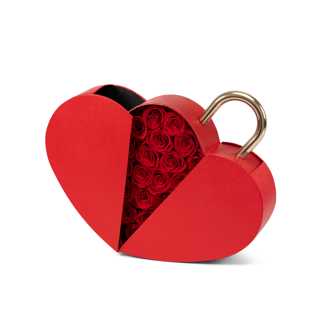Maison de Hera red heart shaped rose box with gold padlock handle, filled with preserved roses